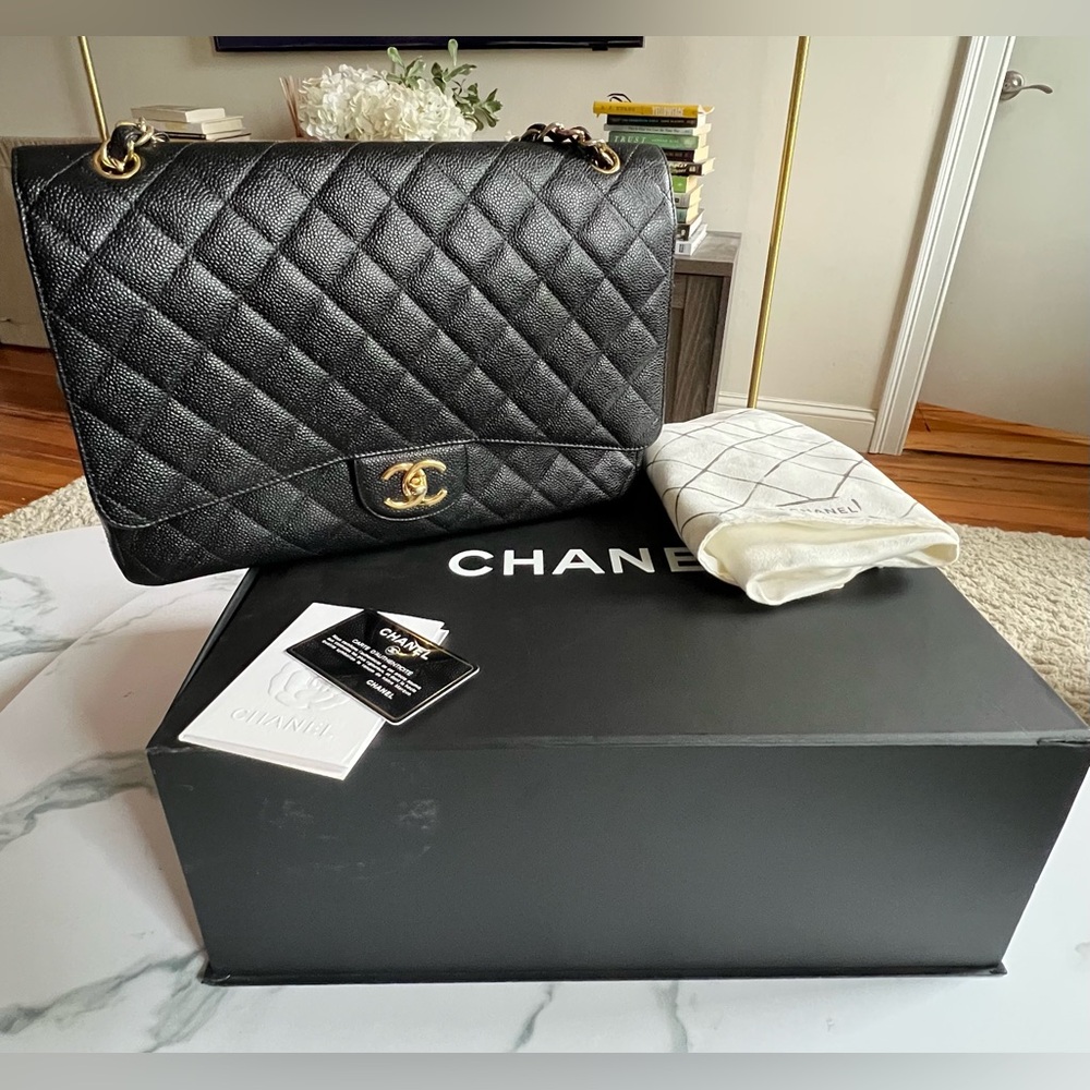 CHANEL Maxi Double Flap Quilted Cavier Bag
